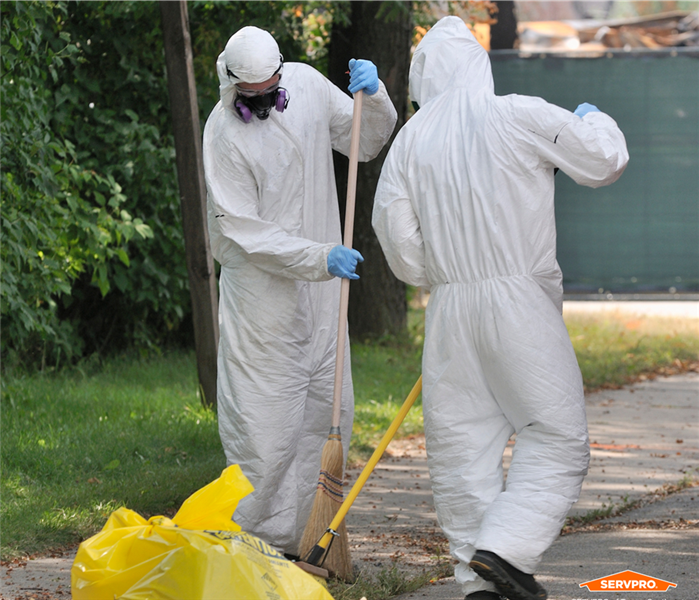 SERVPRO of Greater Carrollwood / Citrus Park cleaning hazardous waste in biohazard suits near me